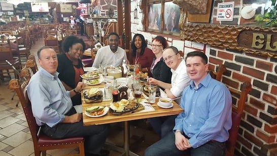 attendees enjoying a ‘goat’ meal_2017 UNICON TDC.jpg