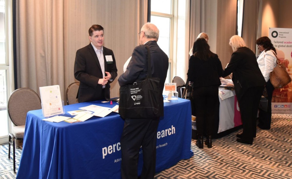 Brian Mahoney chats with IACBE attendee