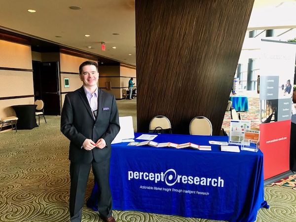 Brian Mahoney (Managing Partner) in front of our booth
